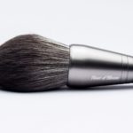Setting and powder brush